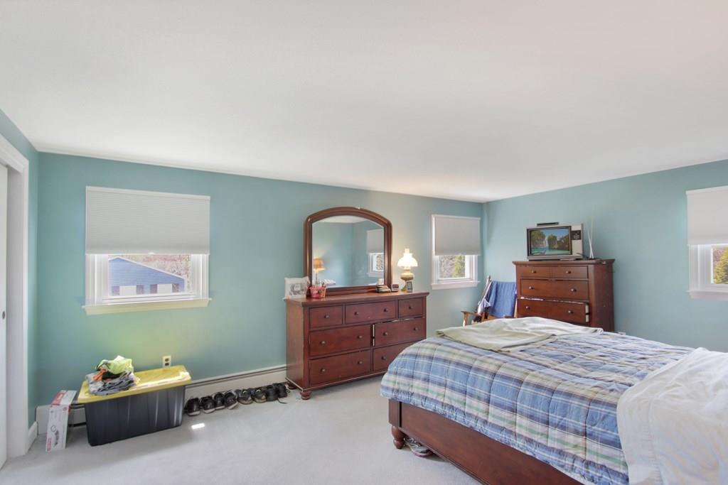 3 Jade Street Methuen, MA 01844 - Photo 21 of 35 a bedroom with a bed and a dresser