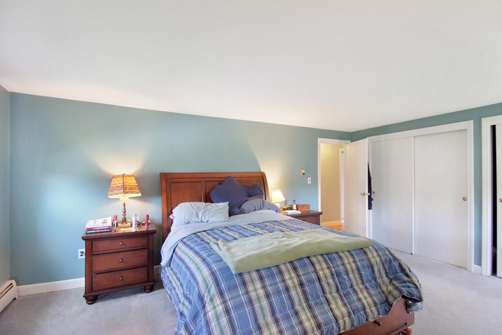 3 Jade Street Methuen, MA 01844 - Photo 22 of 35 a bedroom with a bed and a lamp
