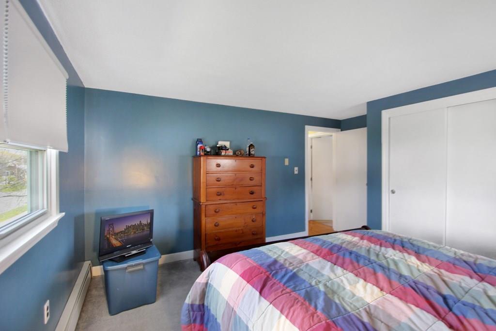 3 Jade Street Methuen, MA 01844 - Photo 25 of 35 a bedroom with a bed and a tv