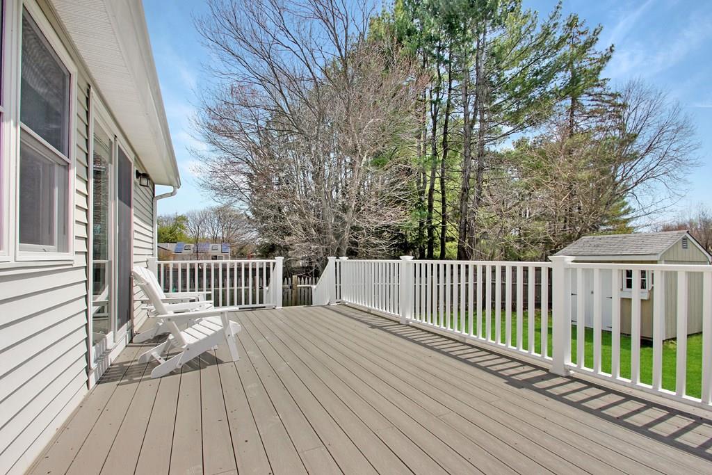 3 Jade Street Methuen, MA 01844 - Photo 29 of 35 a view of a wooden deck with a trees