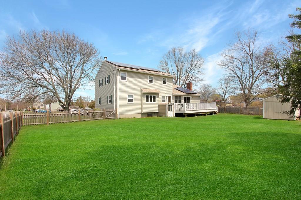 3 Jade Street Methuen, MA 01844 - Photo 32 of 35 a view of a white house with a big yard
