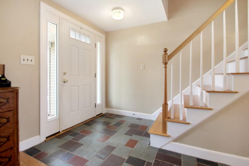 3 Jade Street Methuen, MA 01844 - Photo 5 of 35 a view of entryway with wooden floor and stairs