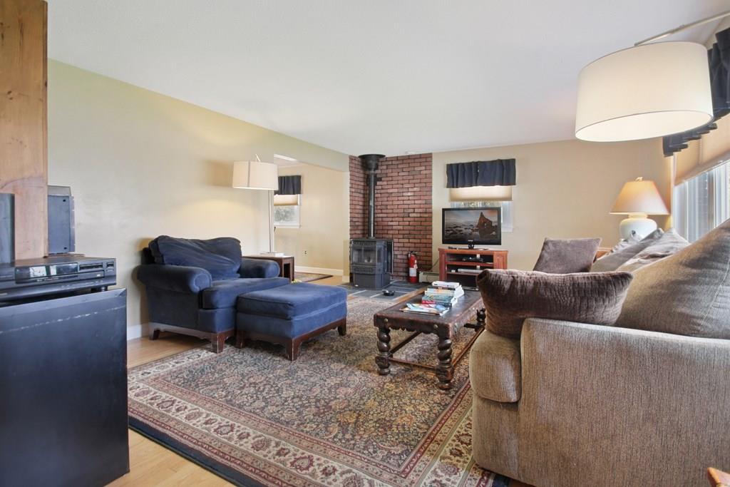 3 Jade Street Methuen, MA 01844 - Photo 7 of 35 a living room with furniture wooden floor and a lamp