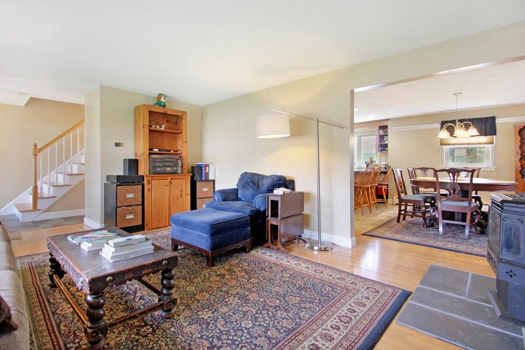 3 Jade Street Methuen, MA 01844 - Photo 10 of 35 a living room with furniture and a dining table