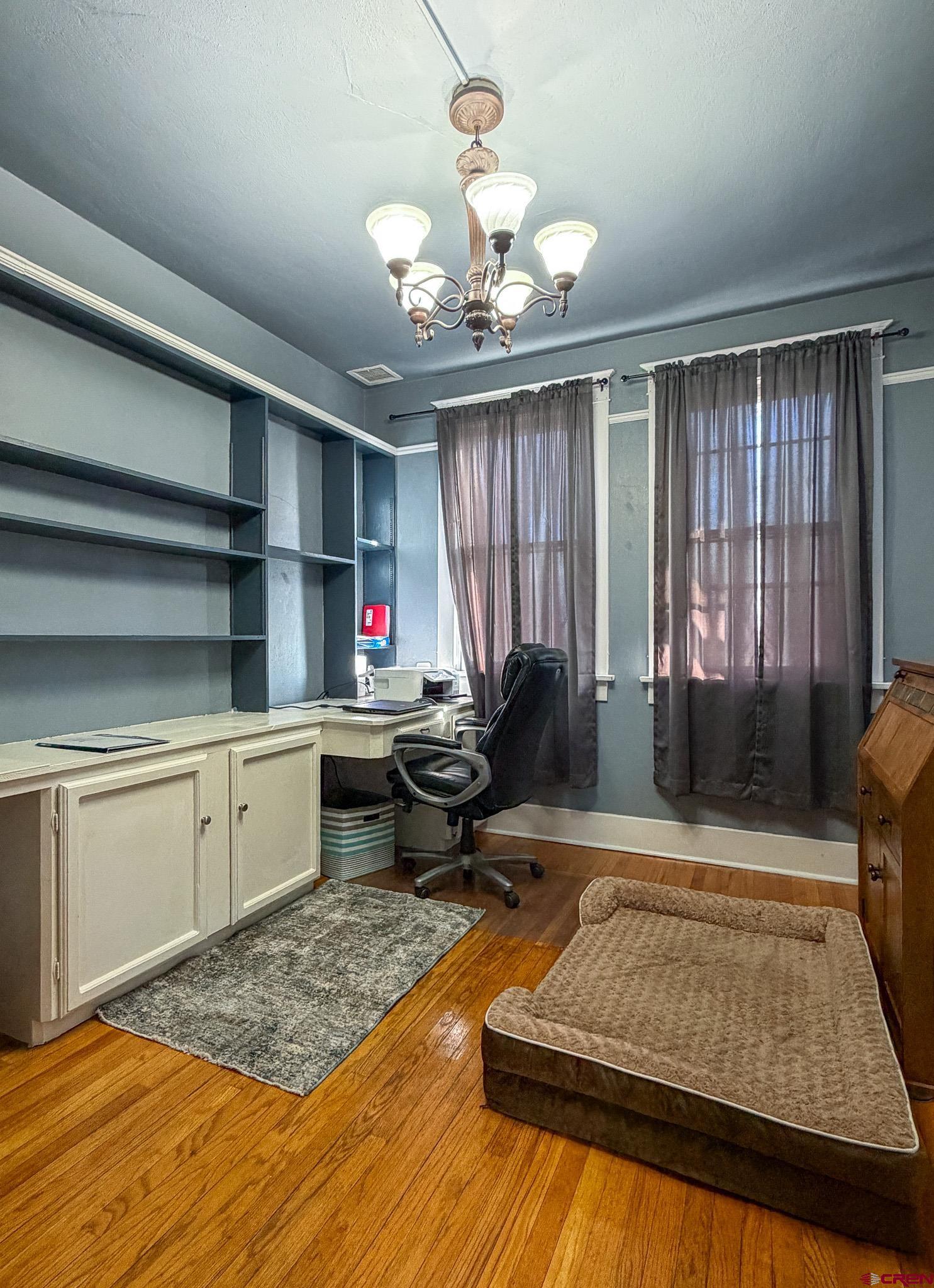 8903 Marshalls Road Austin, CO 81410 - Photo 12 of 45 a kitchen with a refrigerator and a stove top oven