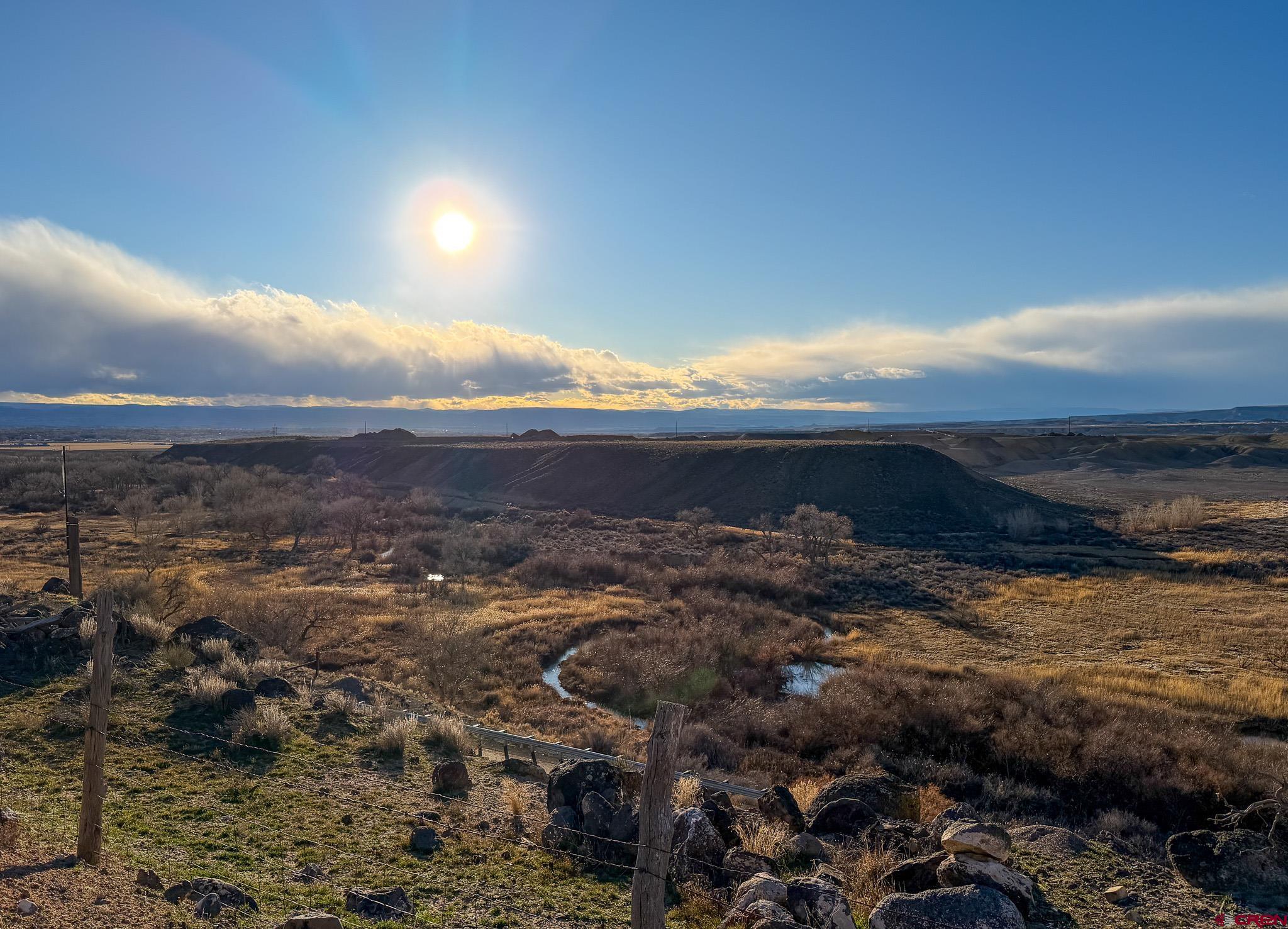 8903 Marshalls Road Austin, CO 81410 - Photo 16 of 45 a view of a sunset