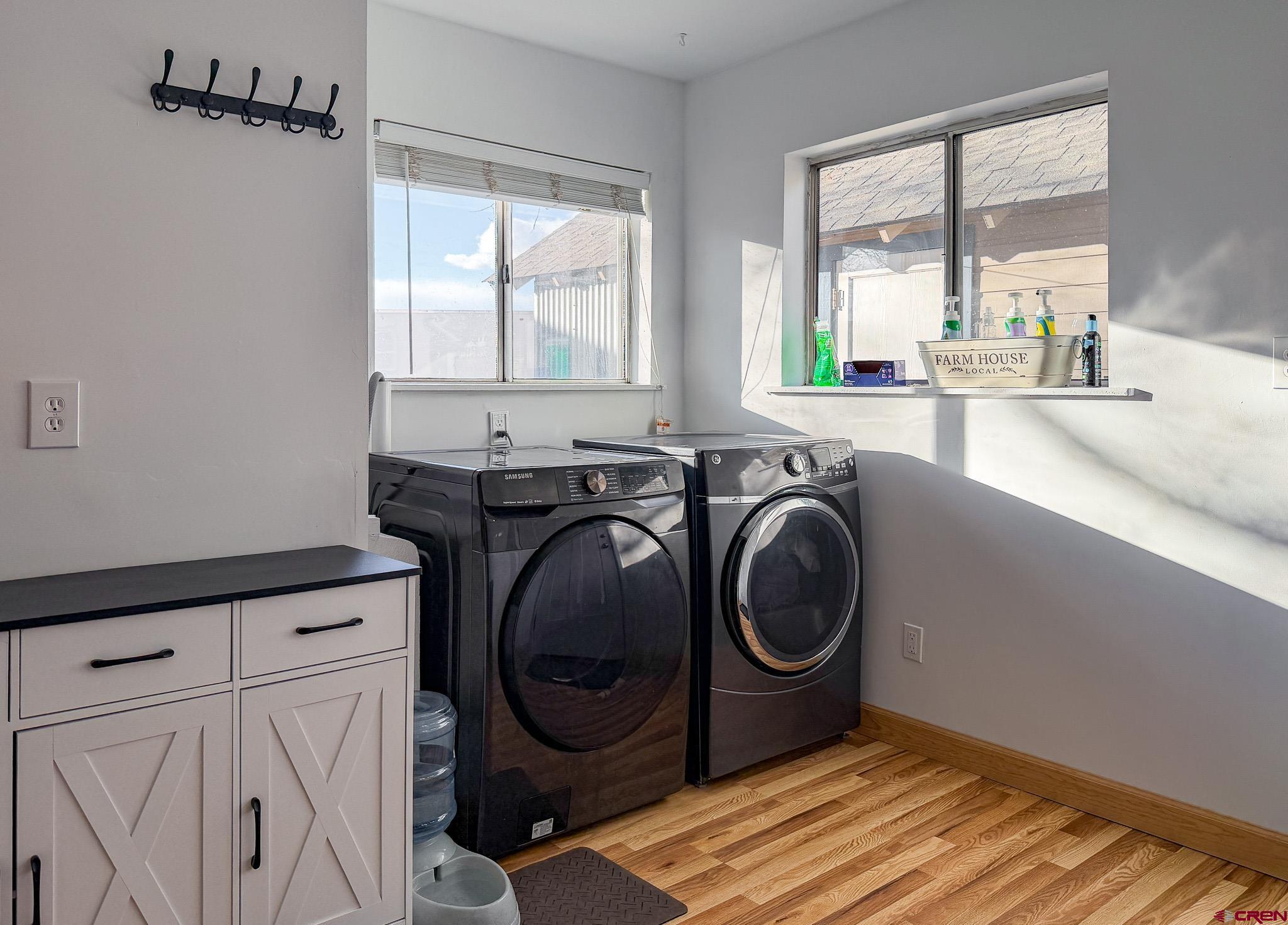 8903 Marshalls Road Austin, CO 81410 - Photo 24 of 45 a utility room with sink dryer and washer