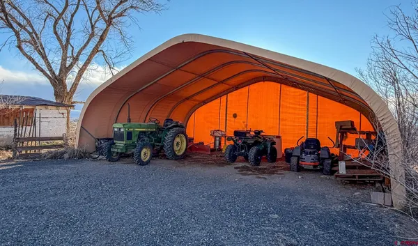 an outdoor space with lots of swings and slides