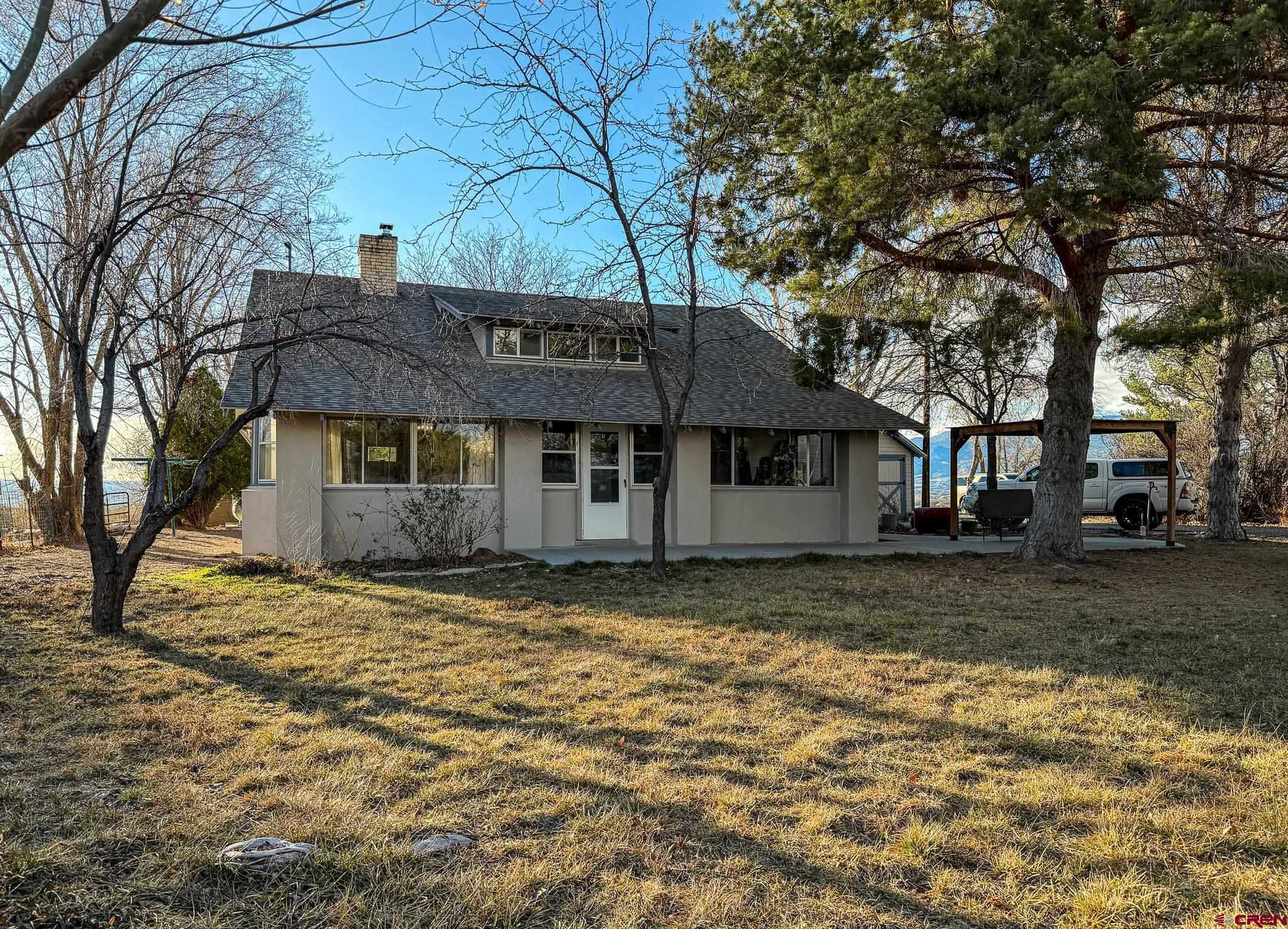 8903 Marshalls Road Austin, CO 81410 - Photo 35 of 45 a view of a house with a yard
