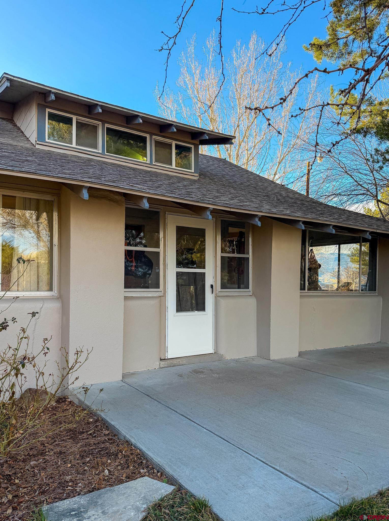 8903 Marshalls Road Austin, CO 81410 - Photo 38 of 45 a front view of a house with a garage