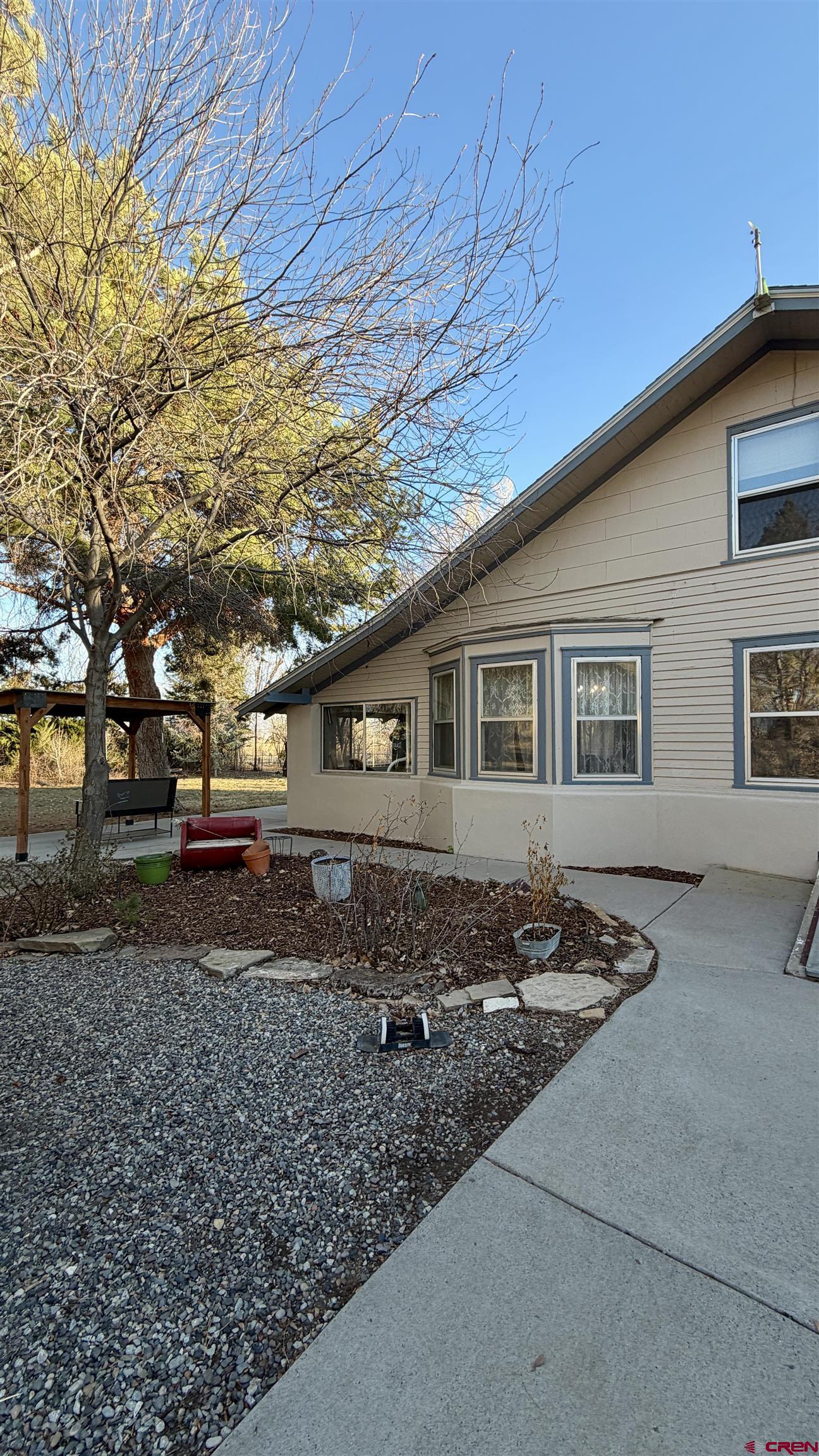 8903 Marshalls Road Austin, CO 81410 - Photo 39 of 45 a front view of a house with a yard