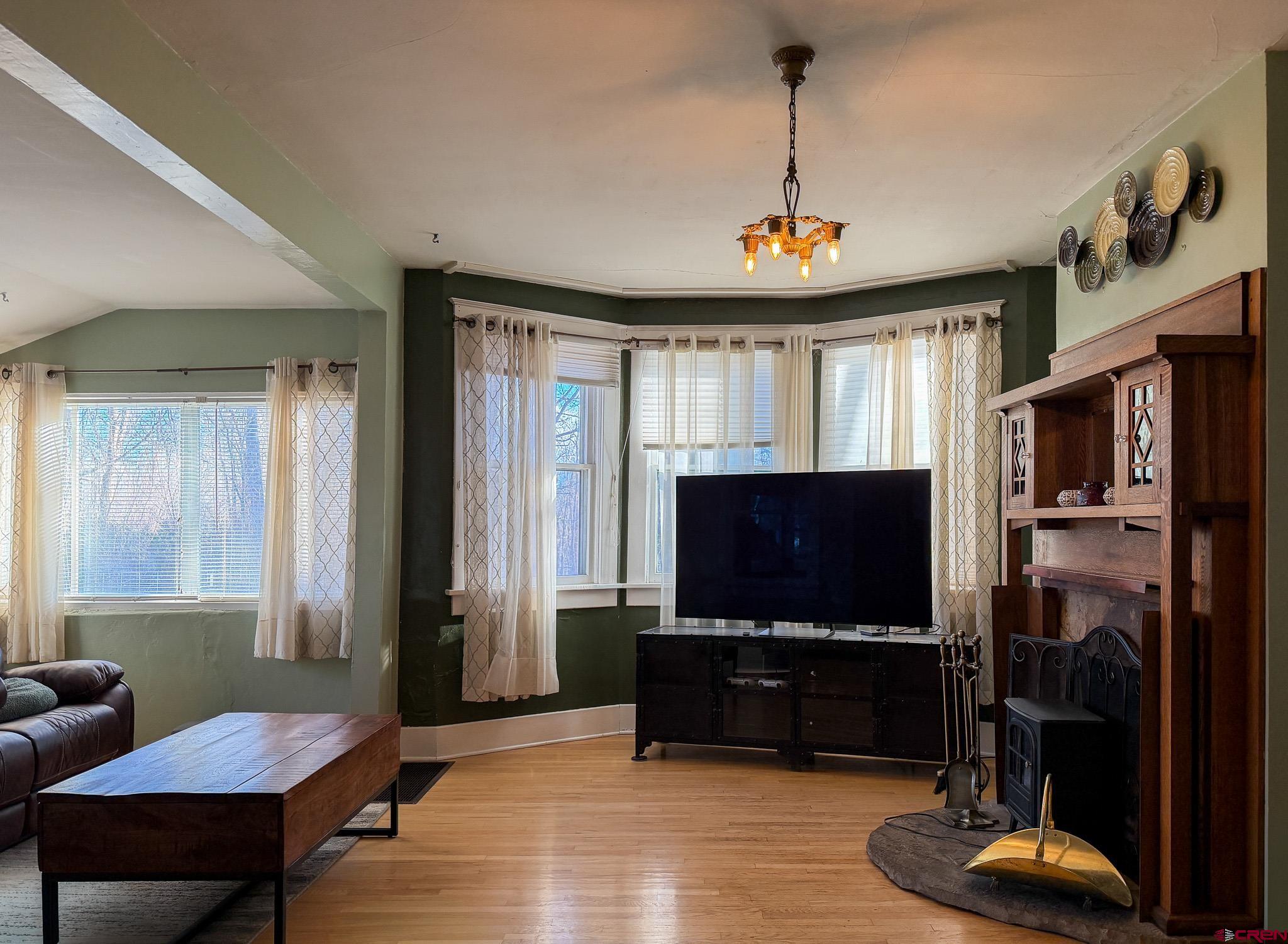 8903 Marshalls Road Austin, CO 81410 - Photo 43 of 45 a living room with furniture and a flat screen tv