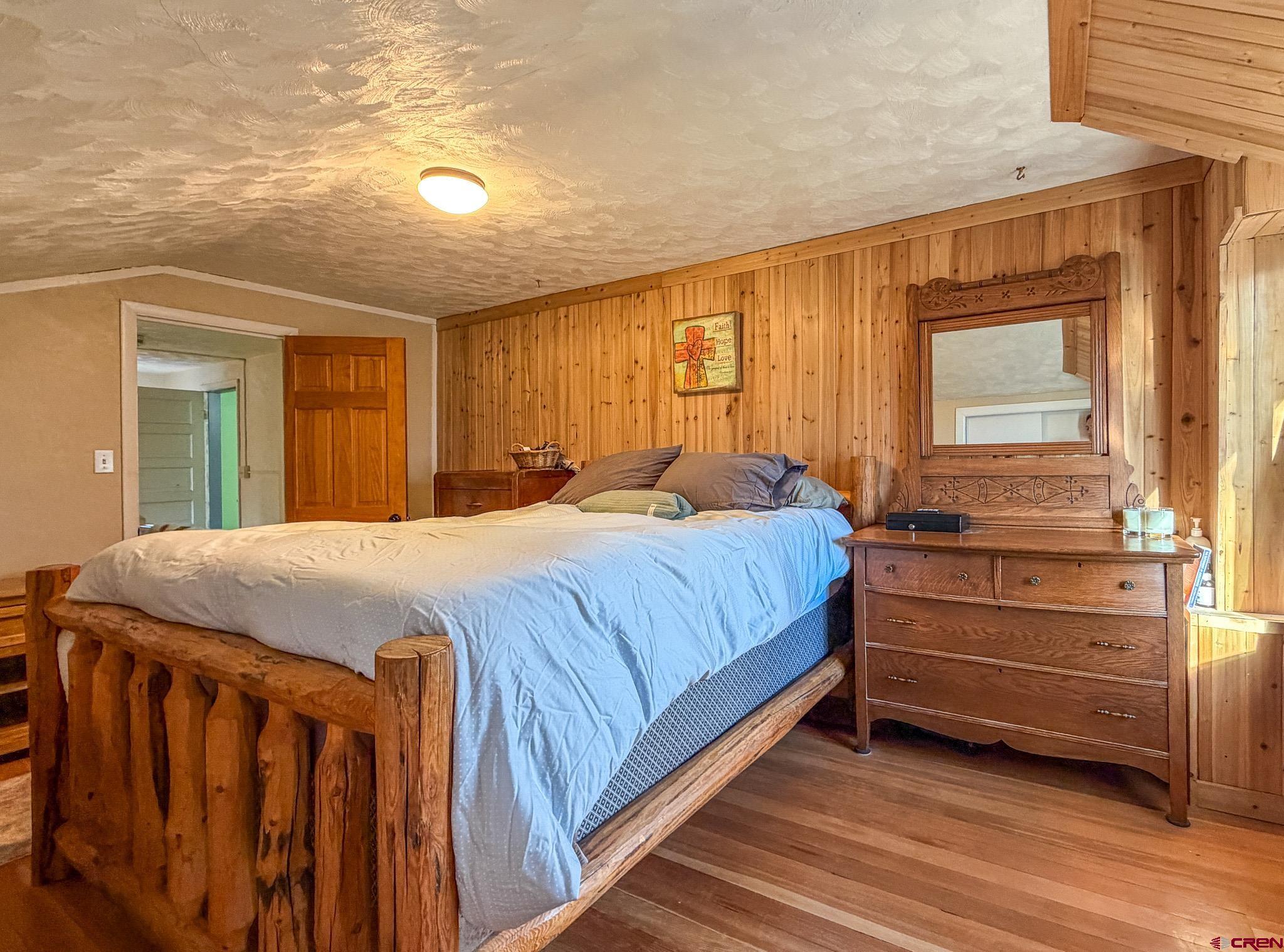 8903 Marshalls Road Austin, CO 81410 - Photo 10 of 45 a bedroom with a bed and window