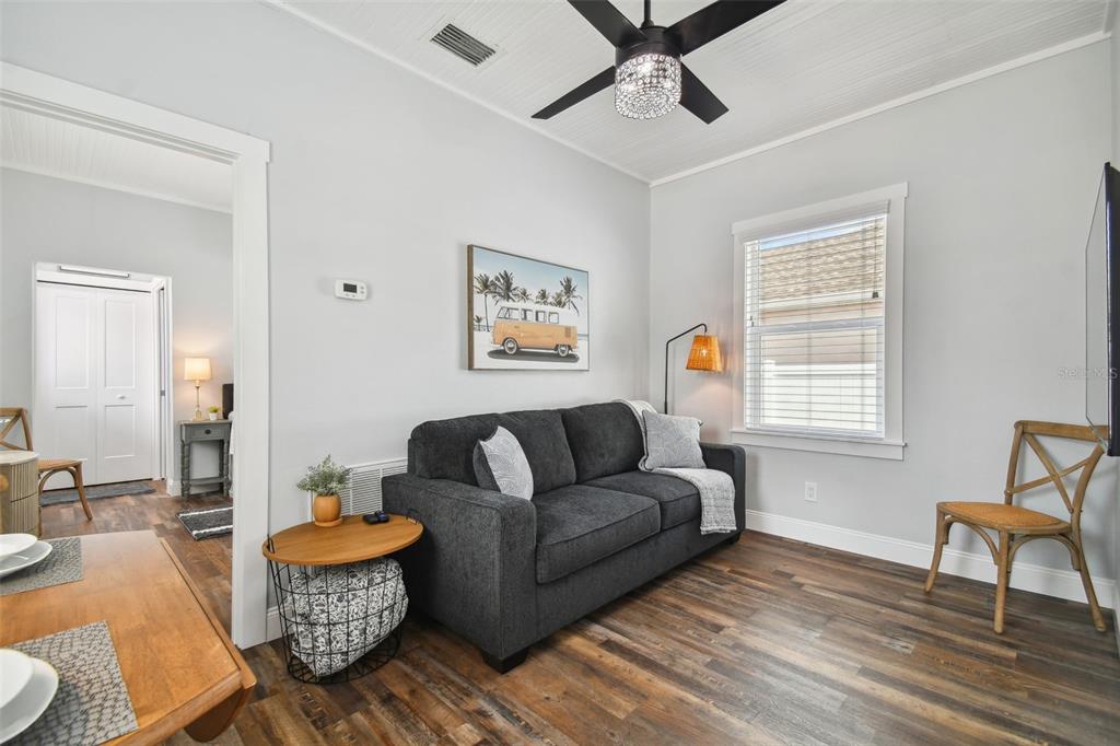 602 Skinner Boulevard Dunedin, FL 34698 - Photo 11 of 27 a living room with furniture and a window