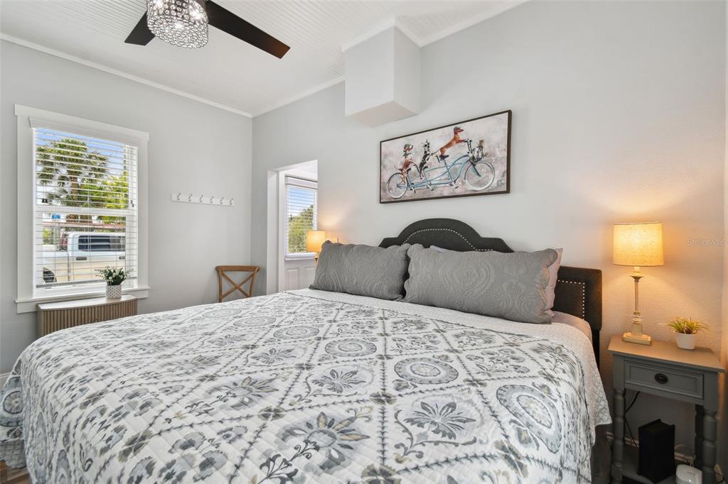602 Skinner Boulevard Dunedin, FL 34698 - Photo 15 of 27 a bedroom with a large bed and a window