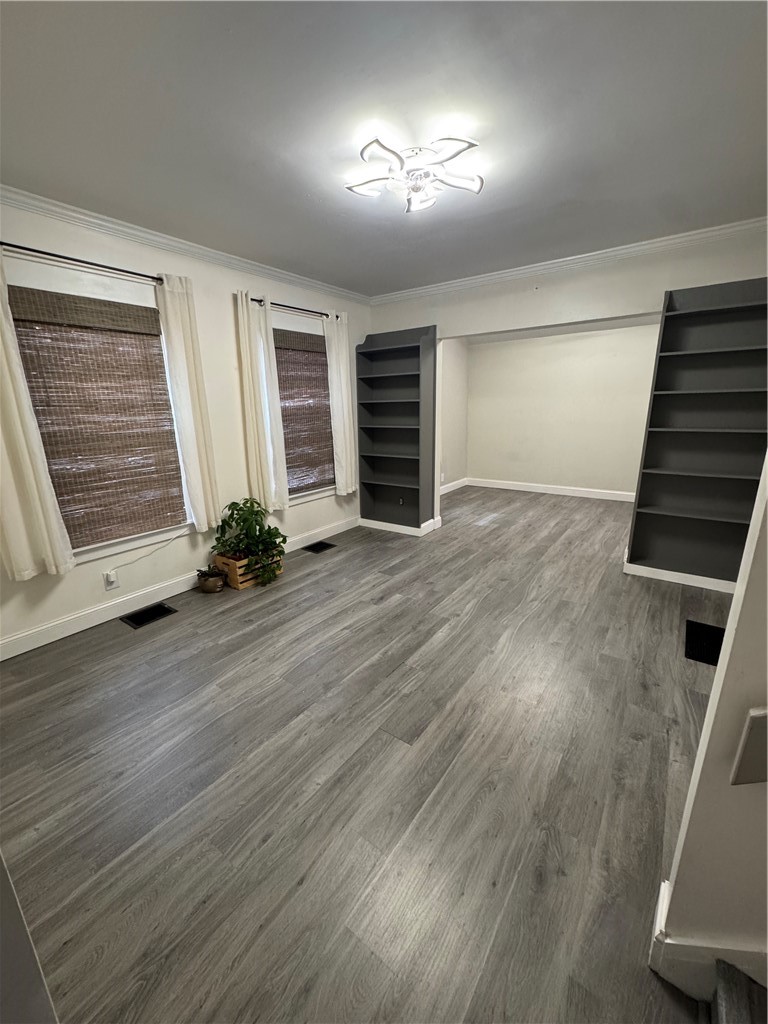 216 South Plain Street Ithaca, NY 14850 - Photo 12 of 47 Den On first floor with shelving units built-in