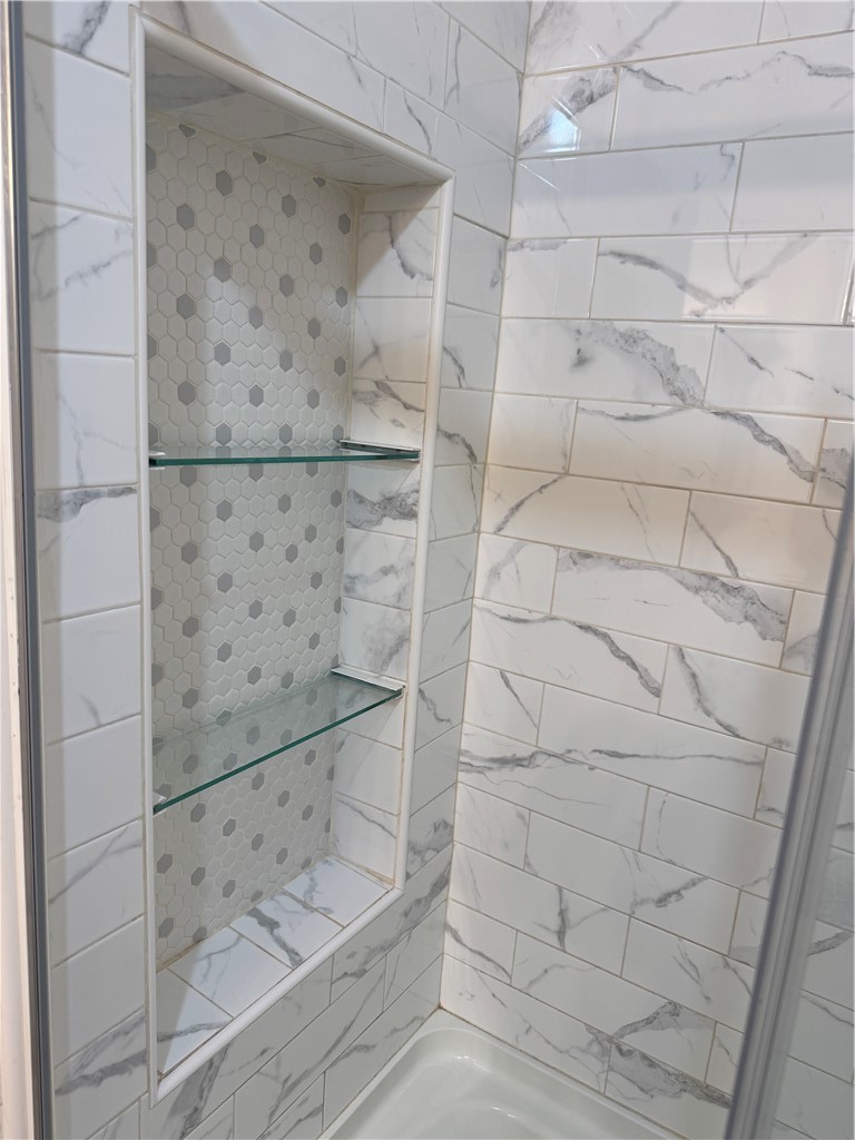 216 South Plain Street Ithaca, NY 14850 - Photo 44 of 47 Shower shelving second floor bathroom