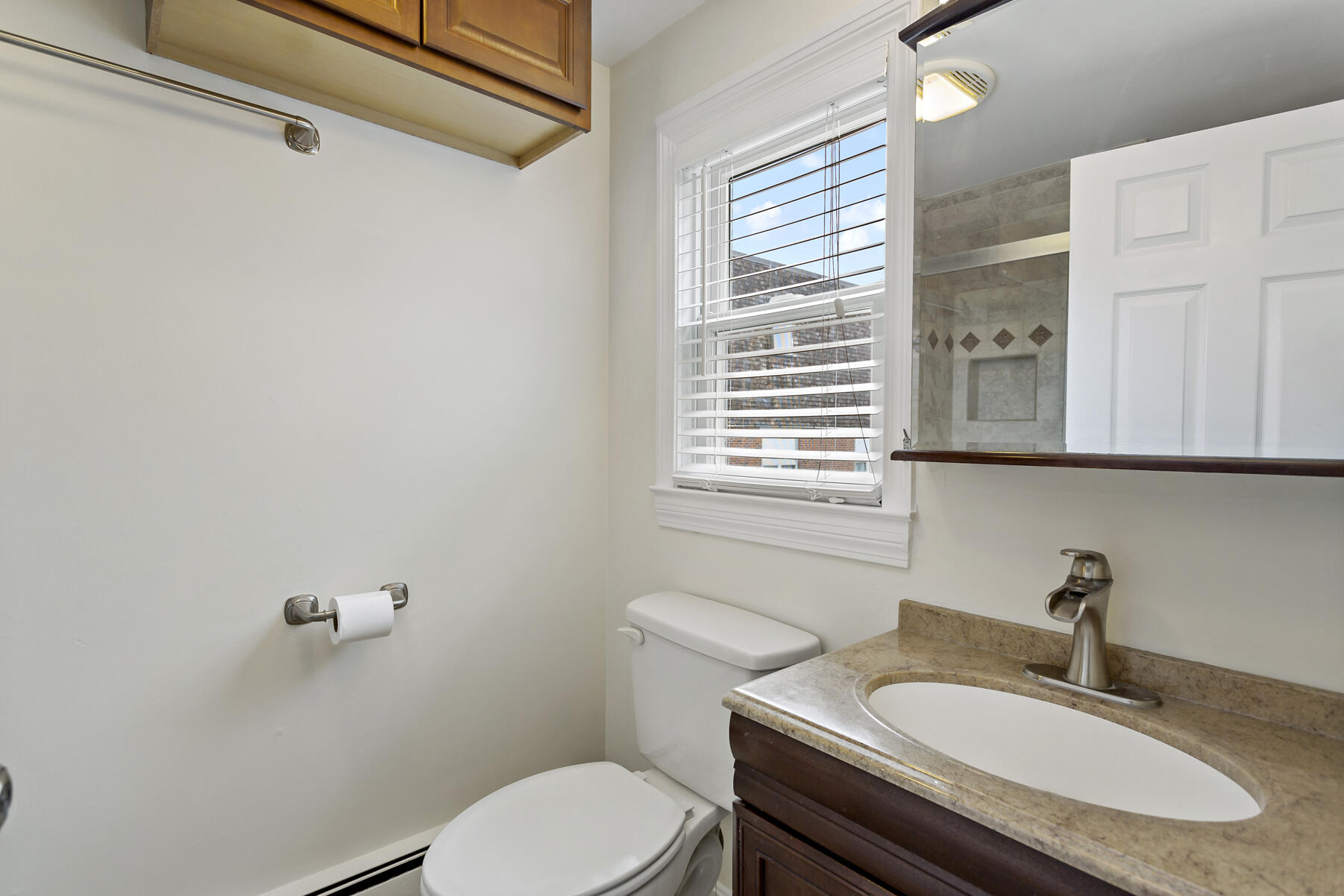 6 Wallace Avenue Buzzards Bay, MA 02532 - Photo 13 of 31 a bathroom with a granite countertop sink and a toilet