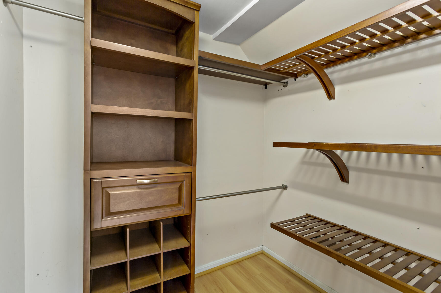 6 Wallace Avenue Buzzards Bay, MA 02532 - Photo 17 of 31 a view of walk in closet with empty racks