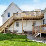 6 Wallace Avenue Buzzards Bay, MA 02532 - Photo 18 of 31 a view of a house with a yard and sitting area
