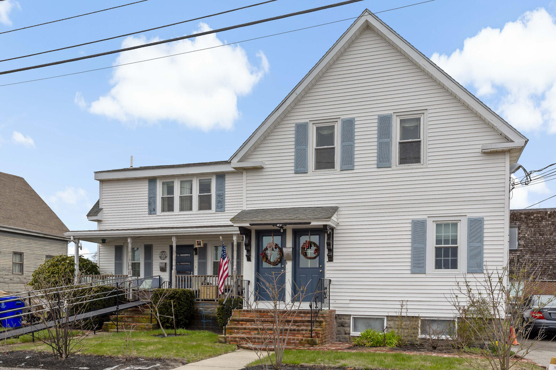 6 Wallace Avenue Buzzards Bay, MA 02532 - Photo 2 of 31 a front view of a house with garden