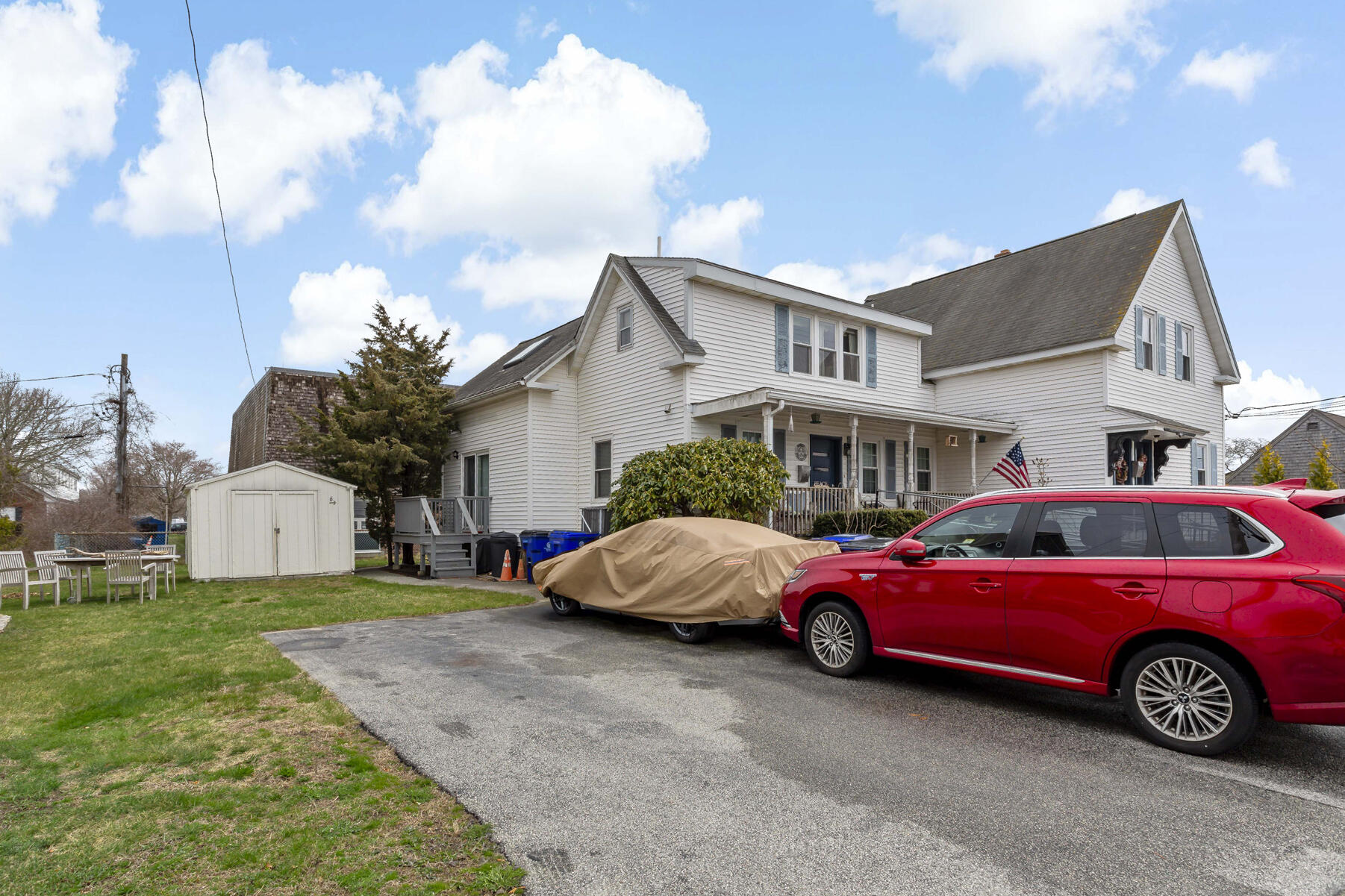 6 Wallace Avenue Buzzards Bay, MA 02532 - Photo 27 of 31 a cars parked in front of a house