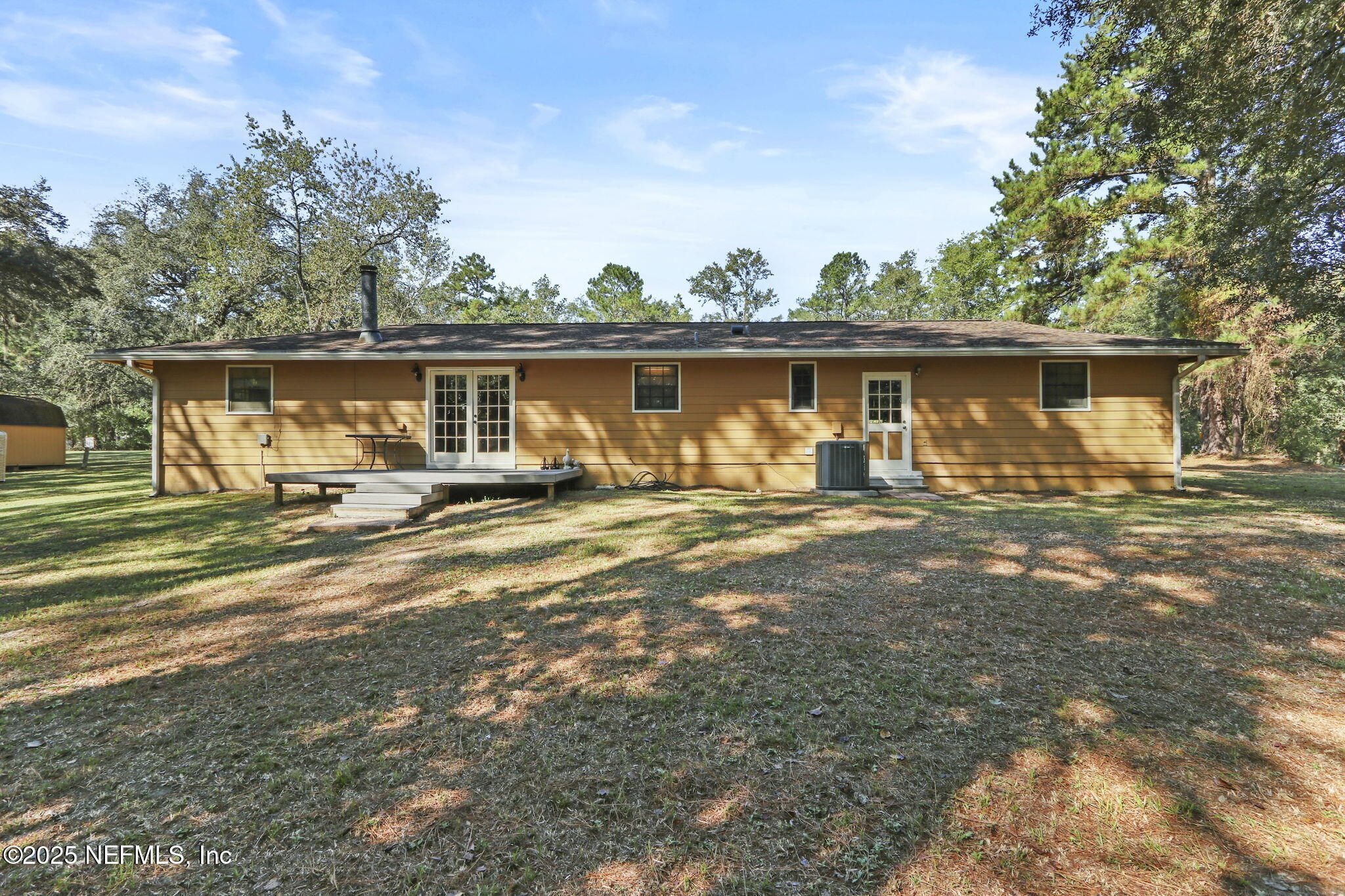 1733 Hereford Road Middleburg, FL 32068 - Photo 17 of 44 a front view of a house with garden