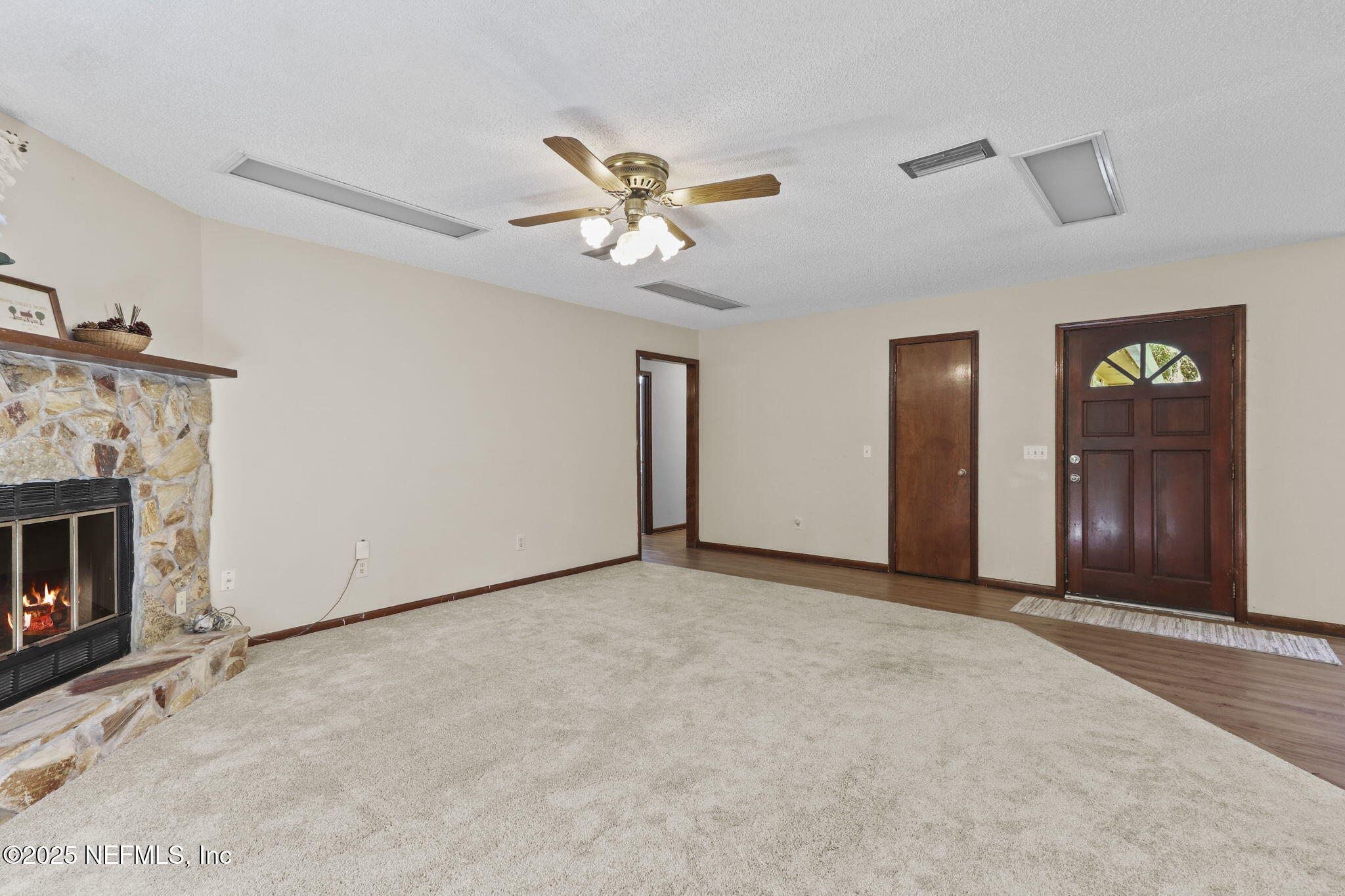 1733 Hereford Road Middleburg, FL 32068 - Photo 27 of 44 a view of an empty room with closet and a fireplace