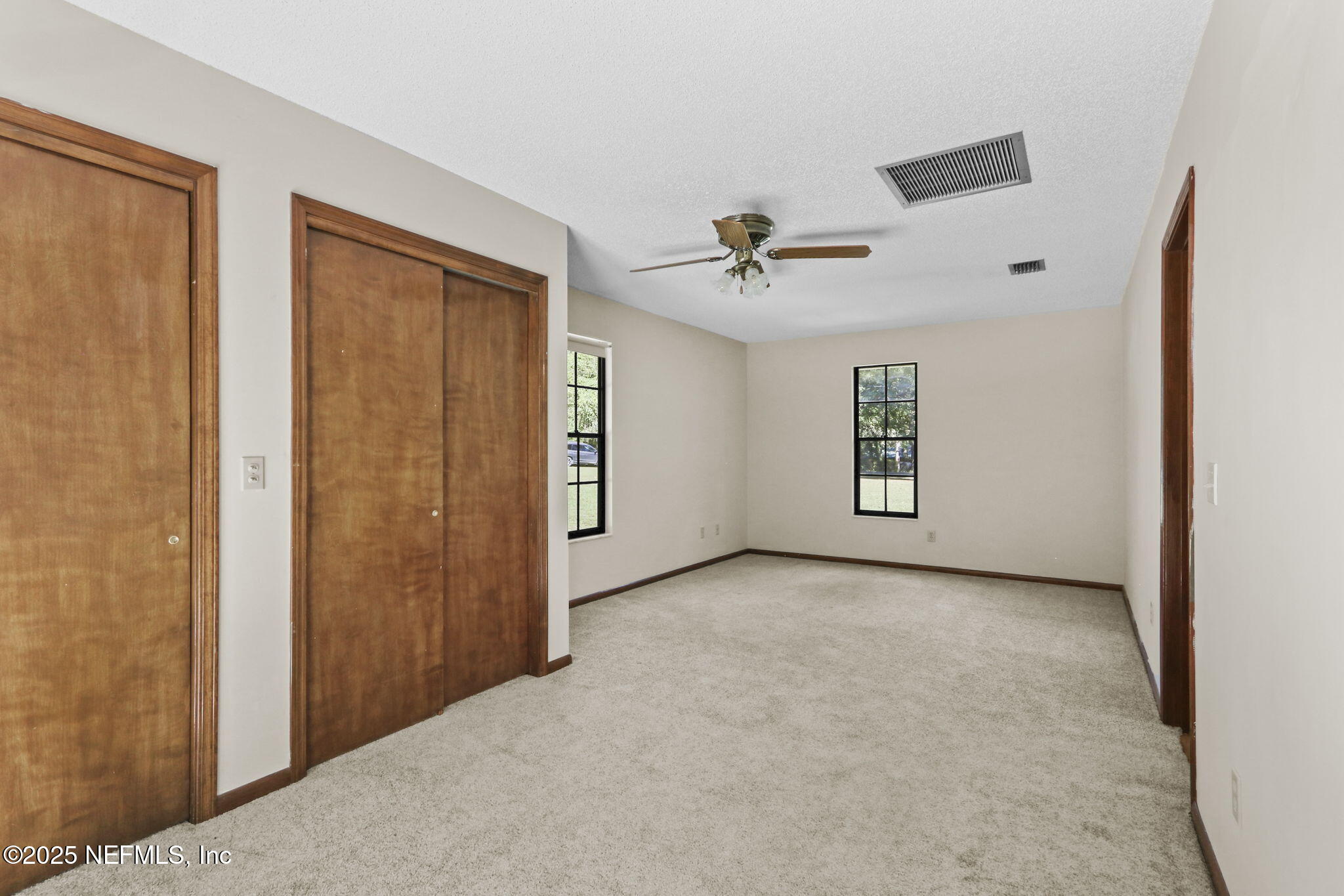 1733 Hereford Road Middleburg, FL 32068 - Photo 37 of 44 a view of a livingroom with a ceiling fan