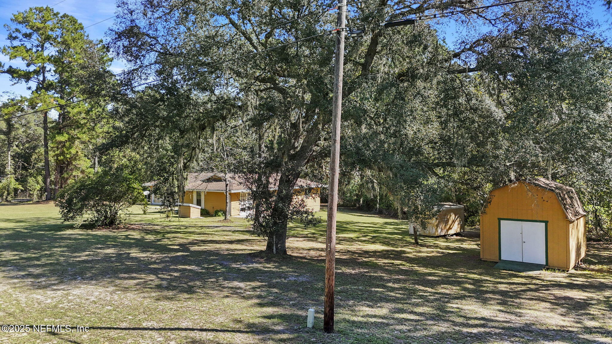 1733 Hereford Road Middleburg, FL 32068 - Photo 5 of 44 a front view of a house with a yard