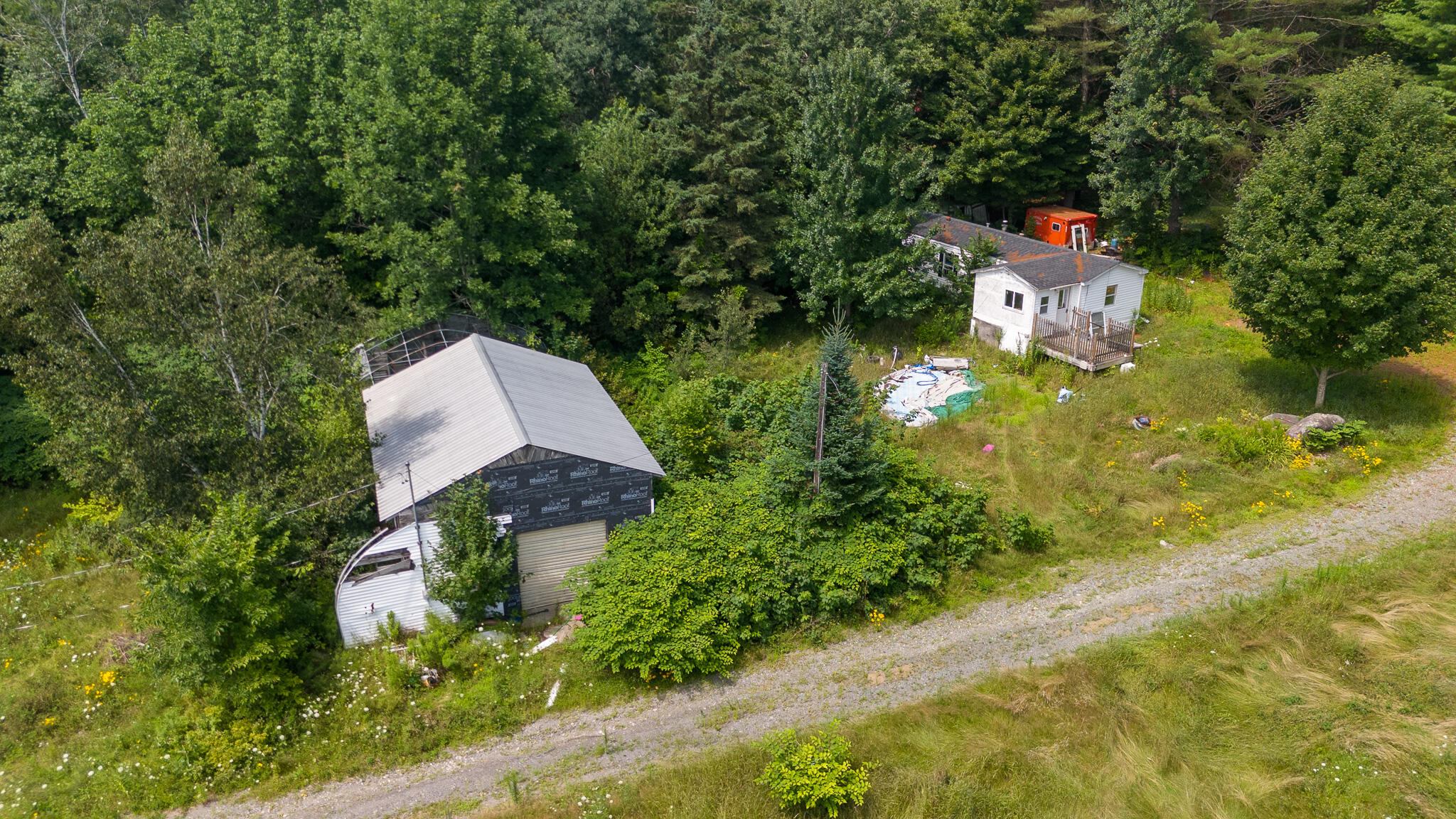 407 A Milo Road Sebec, ME 04481 - Photo 2 of 63 DJI_20240718115032_0383_D