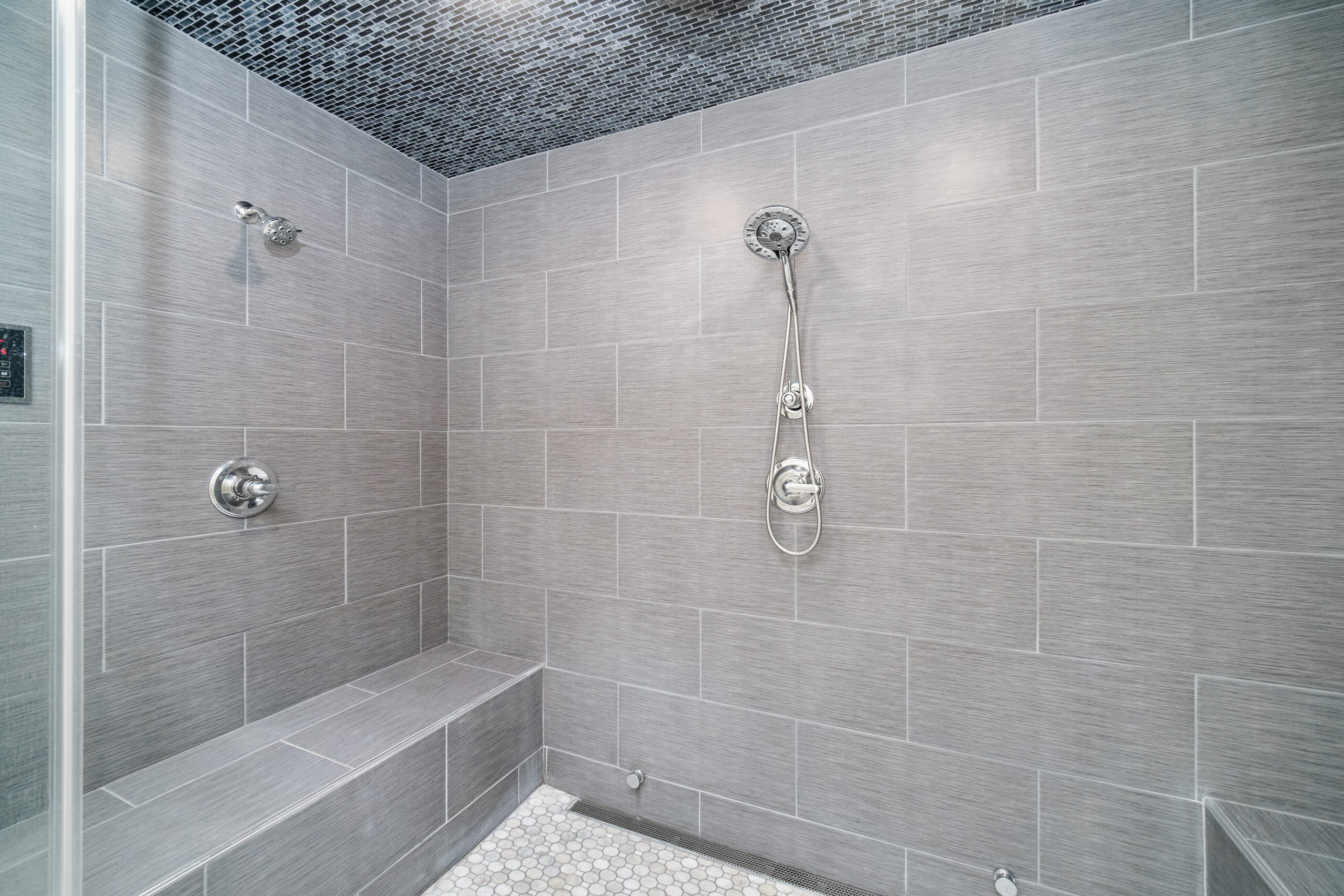 5859 Potter Road Onekama, MI 49675 - Photo 24 of 85 3 regular plus rain showerheads