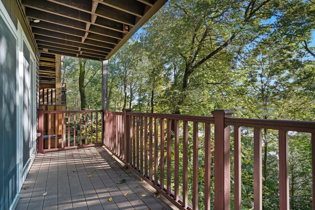 184 Rawson Road Brookline, MA 02445 - Photo 2 of 29 a view of a balcony with wooden floor