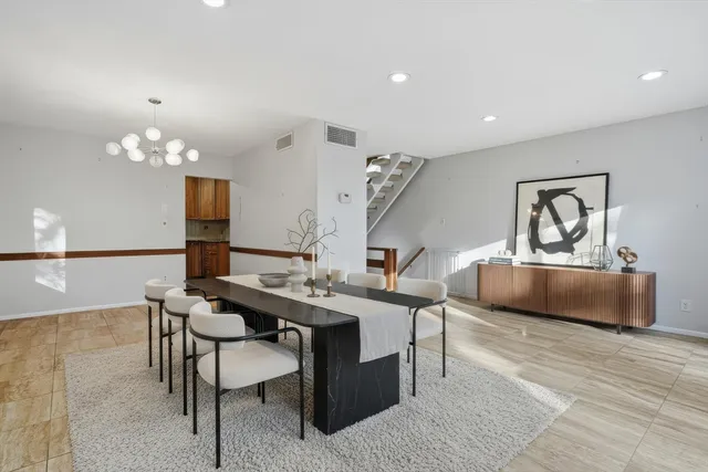 a view of a dining room with furniture