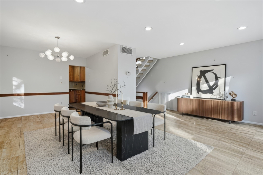 184 Rawson Road Brookline, MA 02445 - Photo 4 of 29 a view of a dining room with furniture
