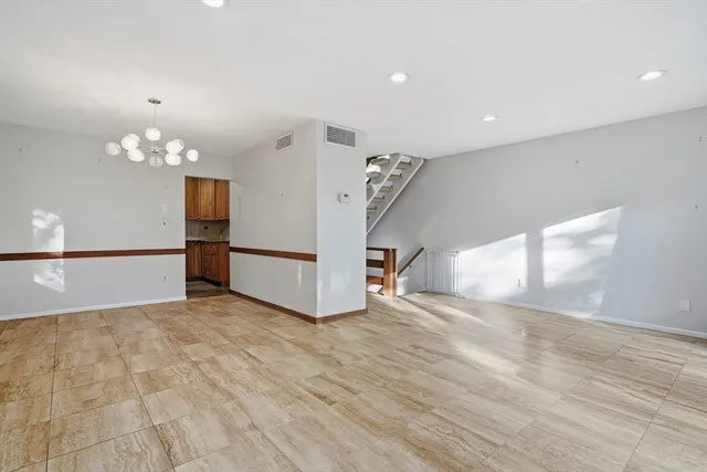 a view of a livingroom with a staircase