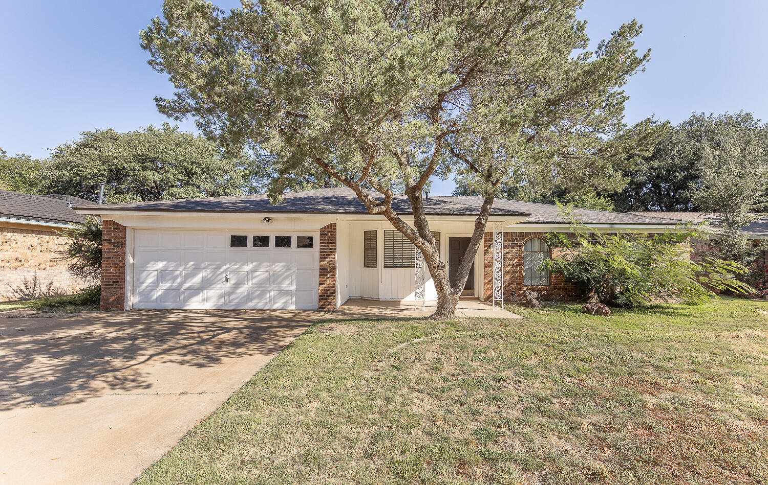 4706 78th Street Lubbock, TX 79424 - Photo 1 of 43 a view of a house with a yard