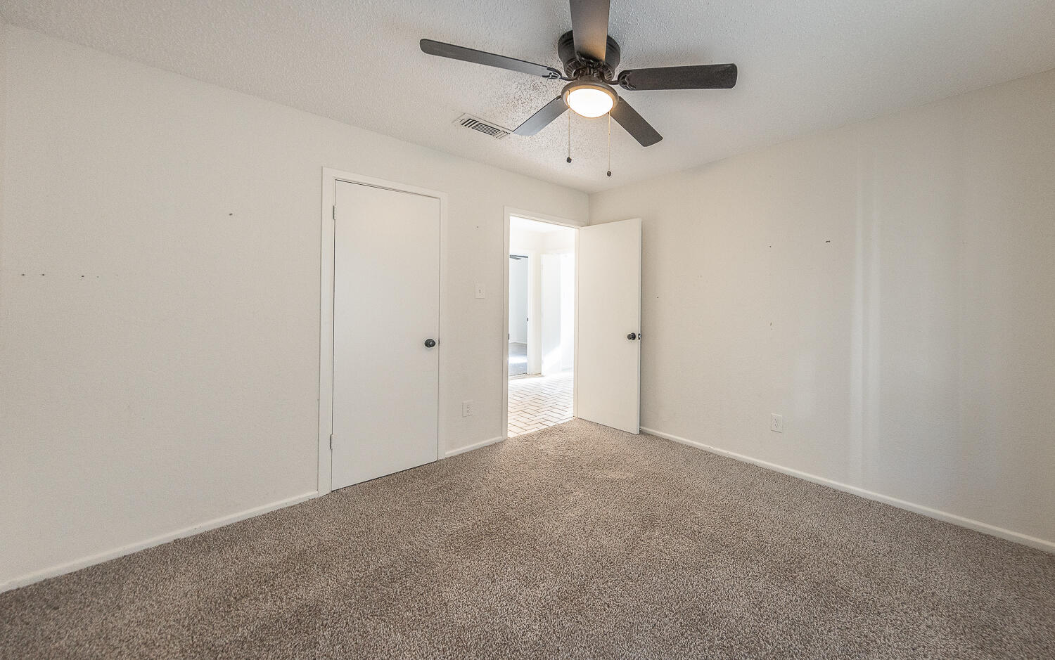 4706 78th Street Lubbock, TX 79424 - Photo 28 of 43 wooden floor in an empty room