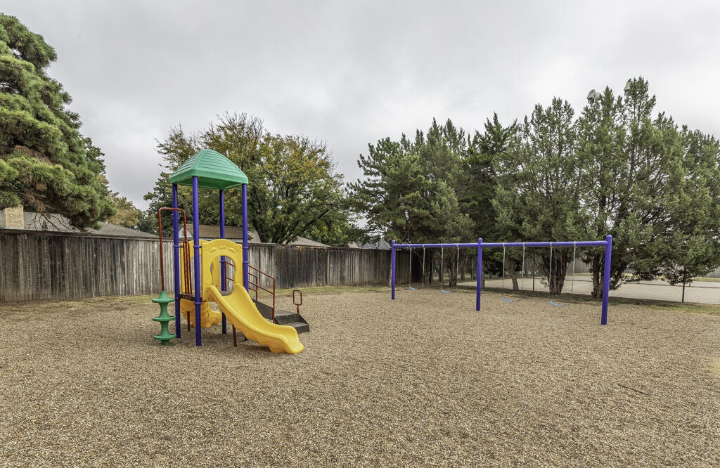 4706 78th Street Lubbock, TX 79424 - Photo 38 of 43 a view of a park with slide