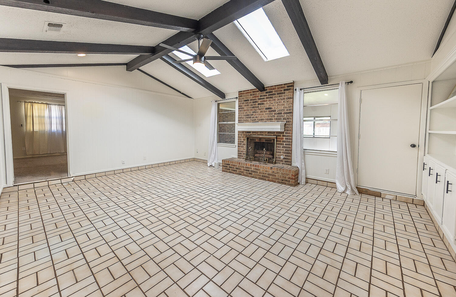 4706 78th Street Lubbock, TX 79424 - Photo 6 of 43 a view of empty room with wooden floor