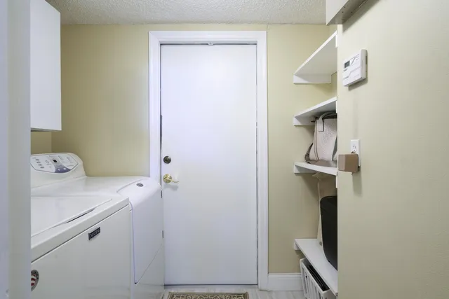 a bedroom with a bed and furniture