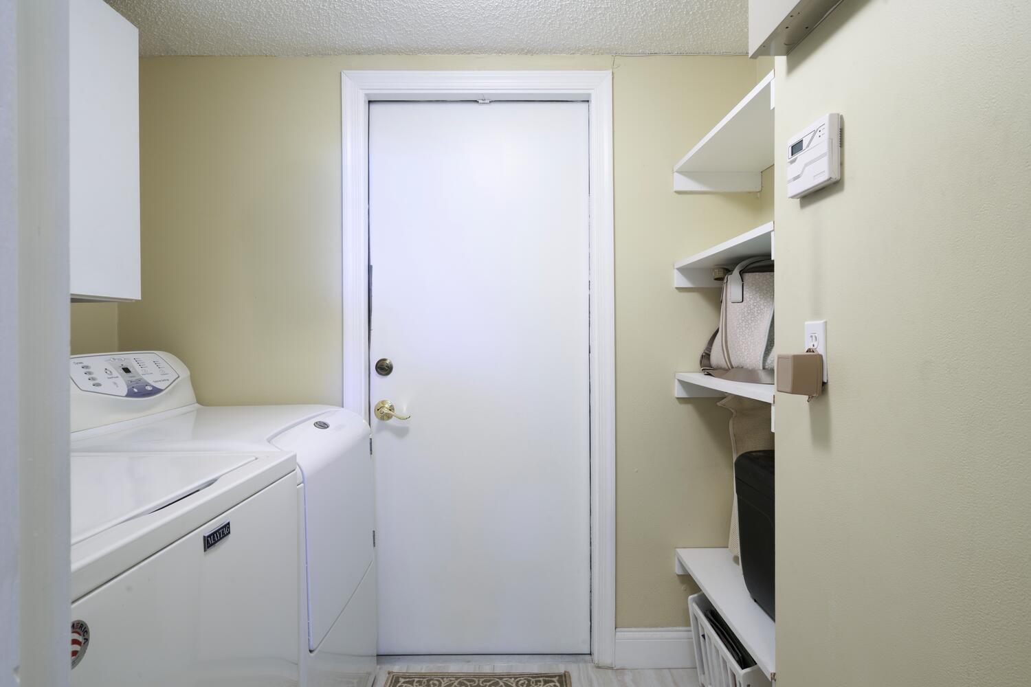 151 St Michaels Court Jupiter, FL 33458 - Photo 31 of 41 a bathroom with a sink and mirror
