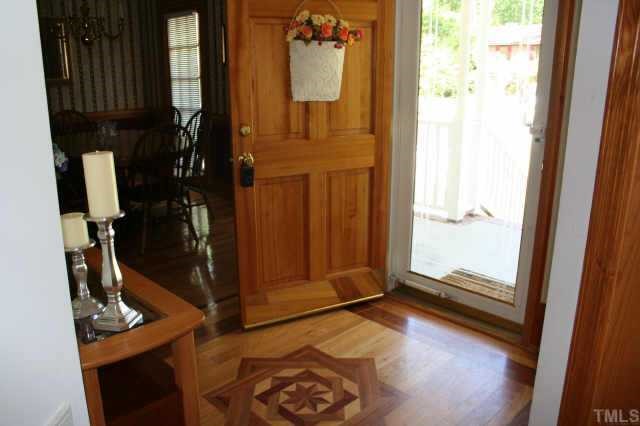 99 Skinner Road Four Oaks, NC 27524 - Photo 2 of 10 Elegant designed hardwoods make a GRAND first impression!!