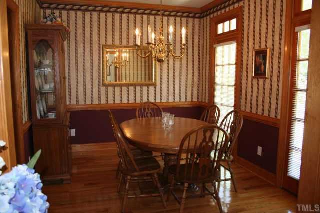 99 Skinner Road Four Oaks, NC 27524 - Photo 5 of 10 Formal dining rm w/ hardwoods, chair rail and crown molding!!
