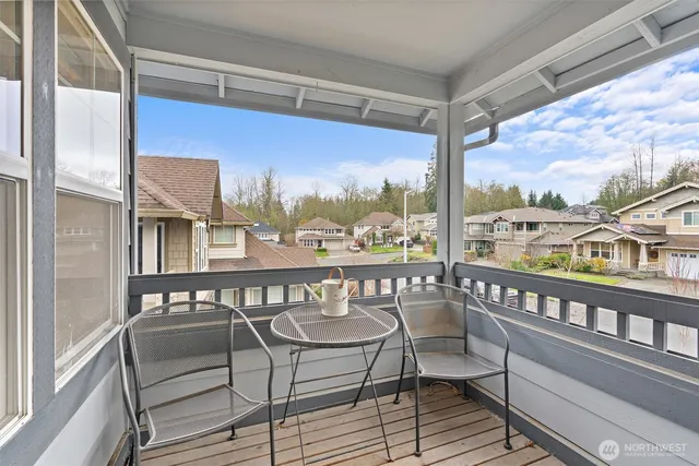 a view of a chairs on the balcony