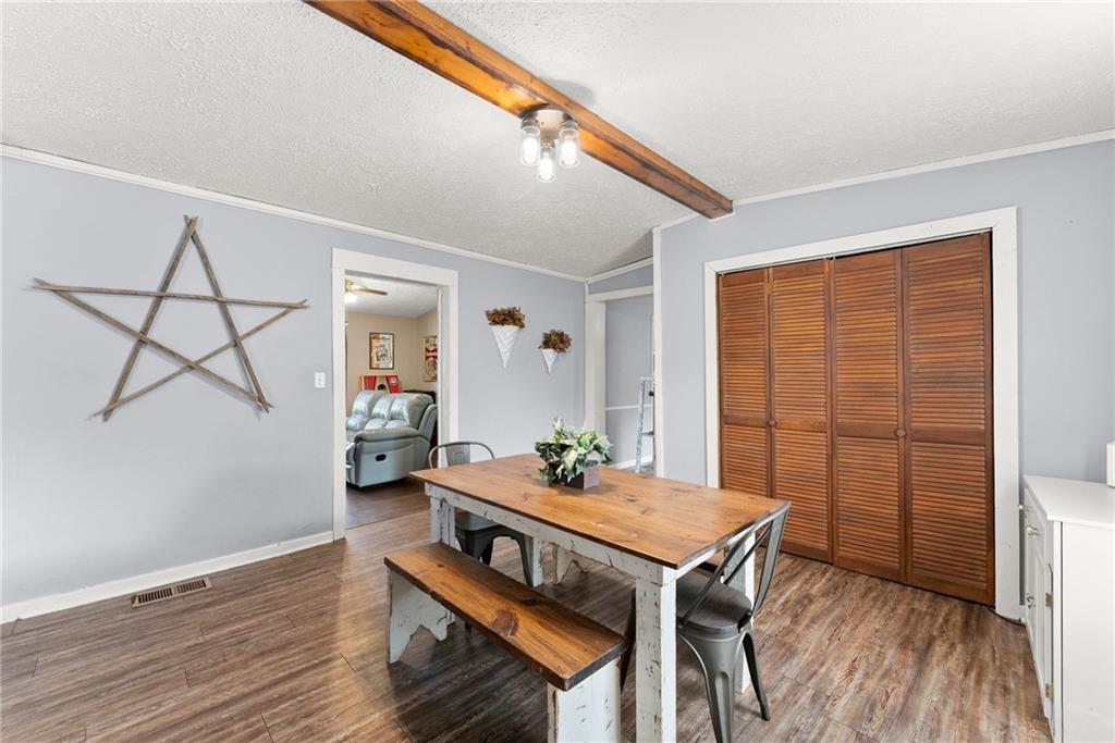 2000 Dr Bramblett Road Cumming, GA 30040 - Photo 8 of 37 a view of a livingroom with furniture and wooden floor