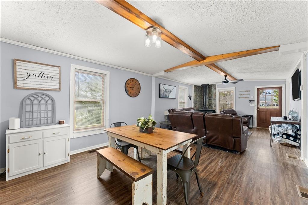 2000 Dr Bramblett Road Cumming, GA 30040 - Photo 9 of 37 a living room with furniture and wooden floor