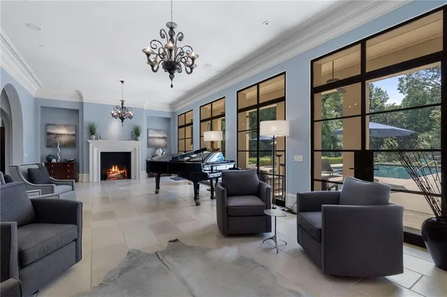 a large kitchen with a table and chairs