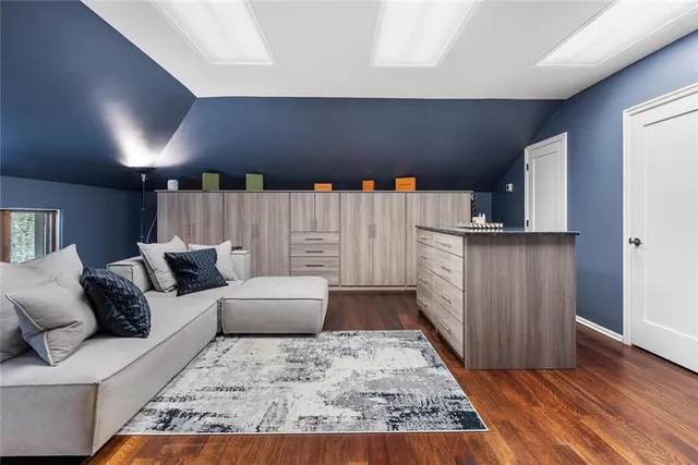 a bathroom with a double vanity sink a and a mirror