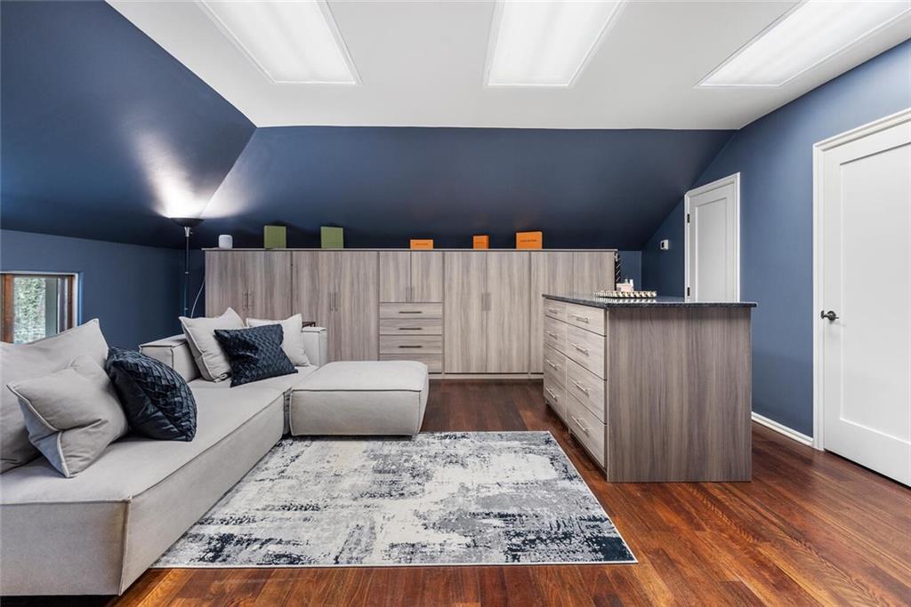 1500 West Wesley Road Northwest Atlanta, GA 30327 - Photo 39 of 60 a living room with furniture and a rug